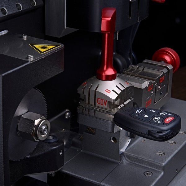 Automotive locksmith programming a car key fob in Las Vegas